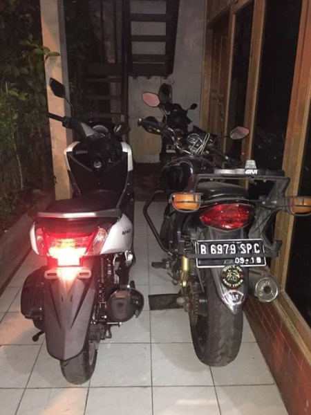 yamaha NMax vs honda Tiger image